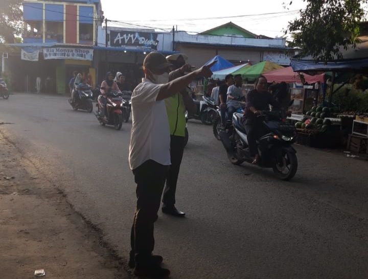 Polsek Tanjung Pura Lakukan Pengamanan Pasar Tradisional