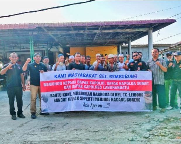 Gerah Maraknya Narkoba, Masyarakat Tanjung Leidong Gelar Aksi Pasang Spanduk