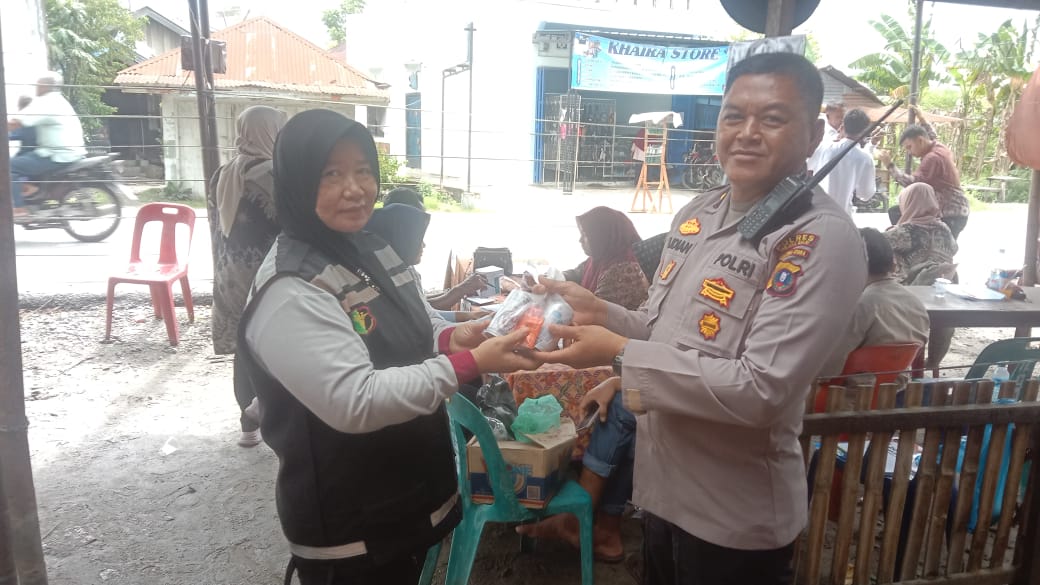 Polres Tanjung Balai Cek Kesehatan Personil Pam TPS dan Berikan Obat