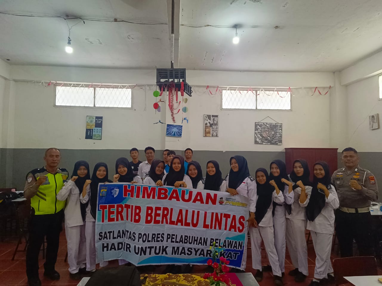 Sat Lantas Polres Pelabuhan Belawan Sosialisasikan Kamseltibcar Lantas ke Pelajar Yayasan Sinar Husni
